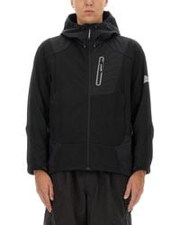 and wander - Hooded Jacket With Adjustable Features - Lyst