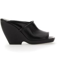KHAITE - The Stagg 105Mm Sandals Mules - Lyst