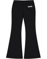 Moschino - Pantalone Flared Con Logo - Lyst