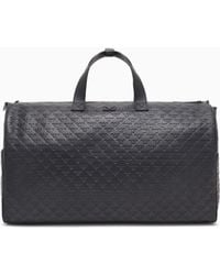 Emporio Armani - Leather Duffel Bag With All-Over Embossed Eagle - Lyst