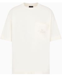 Emporio Armani - T-shirt Over Fit In Jersey Heavy Con Tasca E Ricamo Logo A Rilievo - Lyst