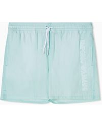 Emporio Armani - Swim Shorts With Stitched Logo Embroidery - Lyst