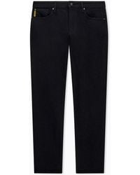Emporio Armani - Slim Fit Five-Pocket Denim Jeans With Metal Logo - Lyst