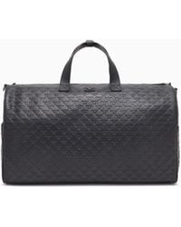 Emporio Armani - Sac De Sport En Cuir, Avec Aigle Embossé All Over - Lyst