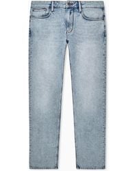 Emporio Armani - Five-Pocket Slim Fit Stone-Washed Jeans With Metallic Logo - Lyst