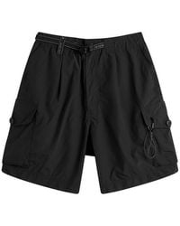 and wander - Oversized Cargo Shorts - Lyst