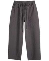 Studio Nicholson - Button Fly Elastic Waist Pant - Lyst