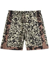 Dries Van Noten - Squiggle Border Print Shorts - Lyst