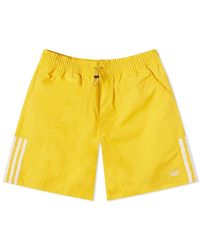 yellow adidas shorts