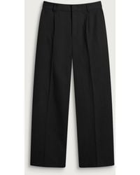 Danny Sizer Daniel Simmons Essential Pleated Trousers in Natural for Men | Lyst
