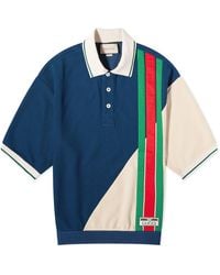 Gucci - Logo-patch Striped Wool And Cotton-blend Polo Shirt - Lyst