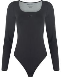 Nike - Form Longsleeve Bodysuit - Lyst