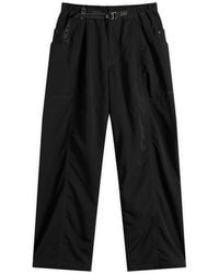 and wander - Crinkled Nylon Trousers - Lyst