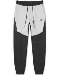 black and white nike tech tracksuit