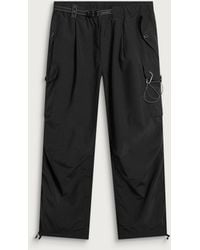 and wander - Oversized Cargo Trousers - Lyst