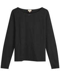 DONNI. - Jersey Bow Long Sleeve Top - Lyst
