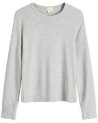 DONNI. - Baby Rib Scallop Long Sleeve Top - Lyst