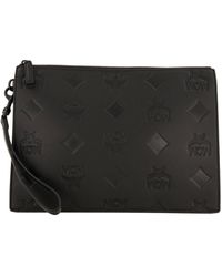 MCM - Tasche aus Leder mit Maxi-Monogramm AREN POUCH - Lyst