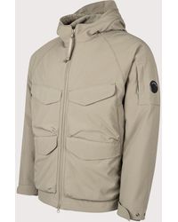C.P. Company - C.P. Shell-R Padded Hooded Lens Jacket - Lyst