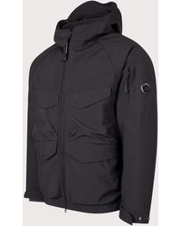 C.P. Company - C.P. Shell-R Padded Hooded Lens Jacket - Lyst