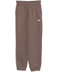 New Balance - Logo-Embroidererd Track Pants - Lyst