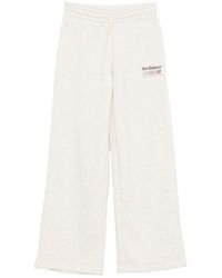 New Balance - Logo-Print Wide-Leg Track Pants - Lyst