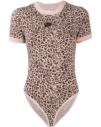rose gold nike bodysuit