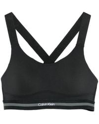 Calvin Klein - Logo-Underband Racerback Sports Bra - Lyst