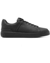 Balmain - Logo-Embossed Leather Sneakers - Lyst