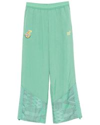PUMA - Logo-Embroidered Track Pants - Lyst