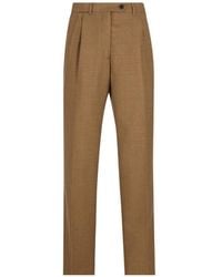 Prada - Pleated Virgin-Wool Trousers - Lyst