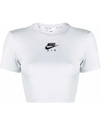 Nike T-shirts for Women - Up to 62% off at Lyst.com