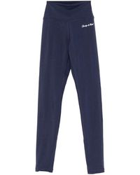 Sporty & Rich - Logo-Print Performance Leggings - Lyst