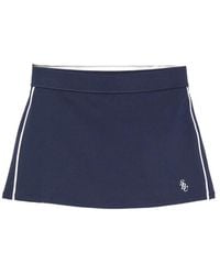 Sporty & Rich - Logo-Embroidered Contrast-Trim Tennis Mini Skirt - Lyst