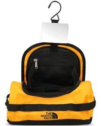 The North Face - Logo-Print Zip-Around Clutch Bag - Lyst