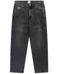Arte' - Faded-Effect Logo-Patch Jeans - Lyst