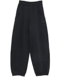 New Balance - Logo-Embroidered Track Pants - Lyst