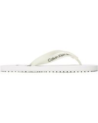 Calvin Klein - Zehentrenner beach sandal monogram tpu ym0ym00838 white ybr - Lyst