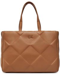 Calvin Klein - Handtasche re-lock quilt tote lg k60k610761 brown sugar ga5 - Lyst