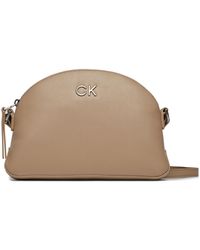 Calvin Klein - Handtasche re-lock seasonal crossbody md k60k611444 silver mink pfa - Lyst