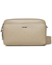 Calvin Klein - Handtasche ck must camera bag_epi mono k60k611926 stoney beige pea - Lyst