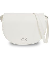 Calvin Klein - Handtasche ck daily saddle bag pebble k60k611679 bright white yaf - Lyst