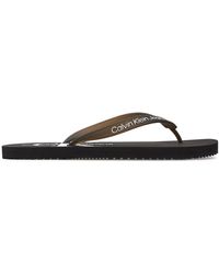Calvin Klein - Zehentrenner beach sandal monogram tpu ym0ym00838 black bds - Lyst
