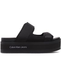Calvin Klein - Pantoletten flatporm sandal webb yw0yw01074 black/lavender aura beh - Lyst