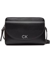 Calvin Klein - Handtasche ck daily camera bag pebble k60k611914 ck black beh - Lyst