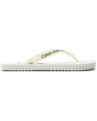 Calvin Klein - Zehentrenner beach sandal monologo tpu yw0yw01246 white ybr - Lyst