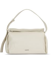 Calvin Klein - Handtasche elevated soft shoulder bag sm k60k610756 dk ecru pc4 - Lyst