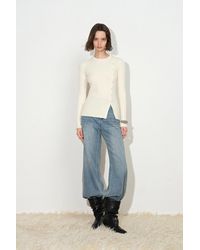Fabrique - Arianna Asymmetric Buttoned Knit Top - Lyst