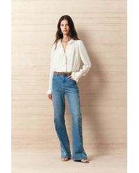 Fabrique - Charlotte Shimmer Ruched Ruffle Blouse - Lyst