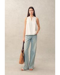 Fabrique - Rosalind Ruffle Neck Tie Front Sleeveless Top - Lyst